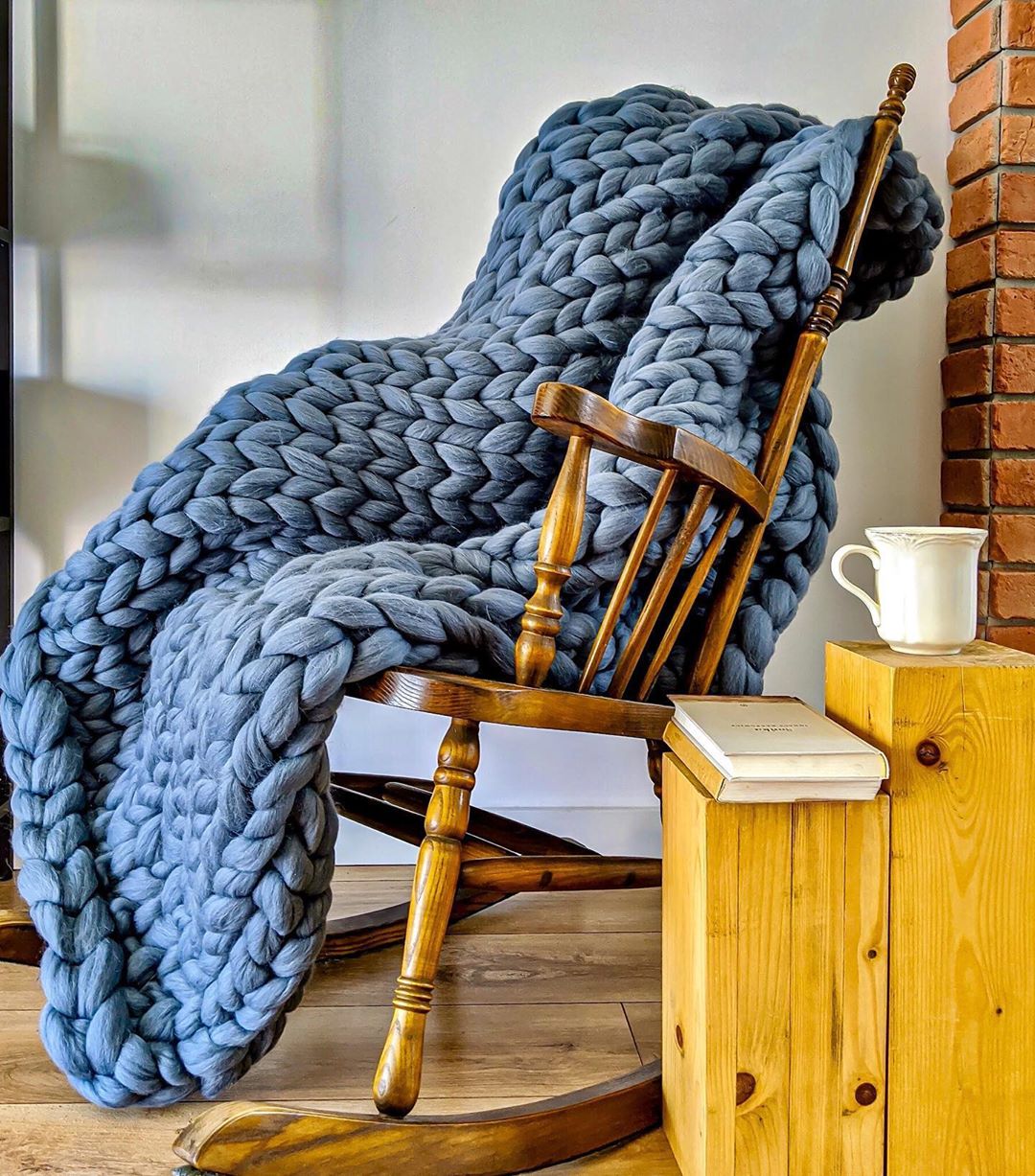 Neutral tones handmade merino throws stack