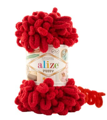 Red yarn ball with 'alize' label on a white background