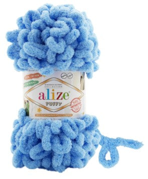 Blue yarn ball with Alize label on a white background