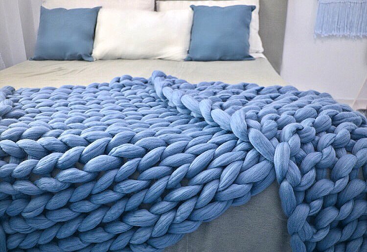 Bordeaux chunky merino throw draped full view