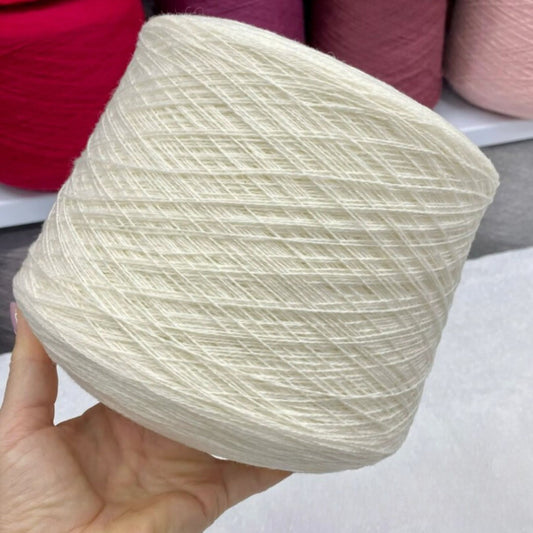 Close-up of luxurious Italian extra fine merino wool yarn 2/16 Nm in soft skein, 800m/100g fingering weight, ultra-soft and silky for knitting and crochet
