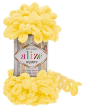 Yellow hair tie with 'alize puffy 216' branding on a white background