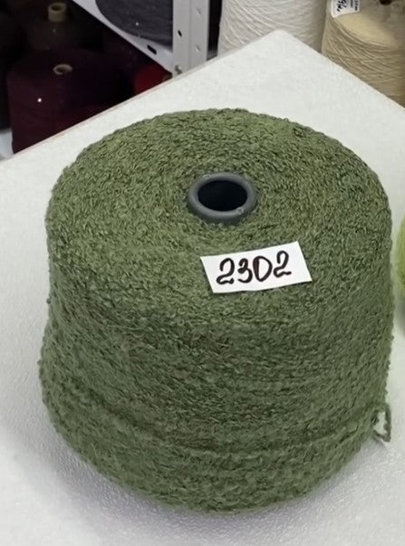 Multiple fluffy boucle skeins from Italy – soft shades