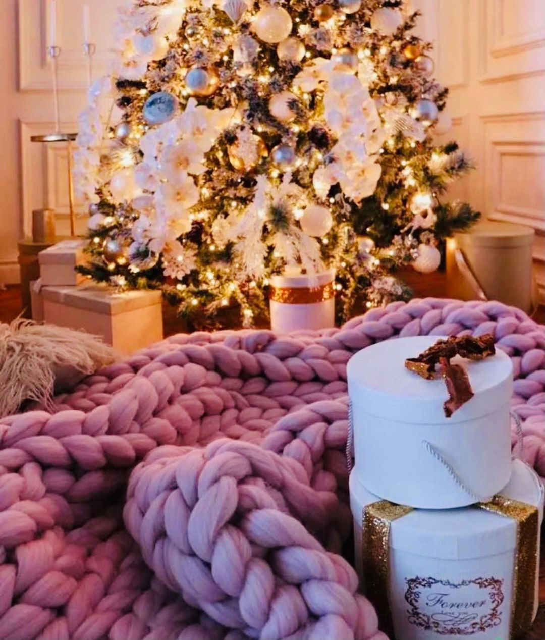 Gray super bulky blanket folded with visible knit texture