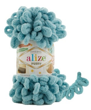Blue yarn ball with 'alize puffy 414' label on a white background