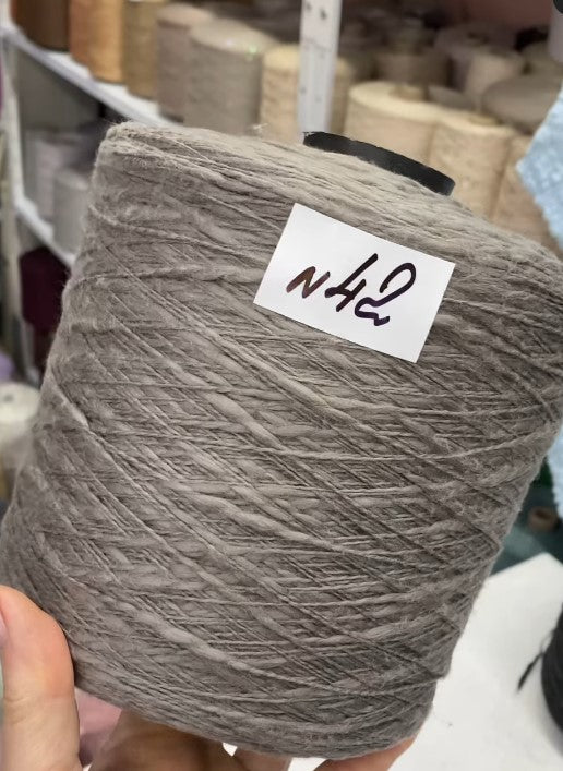 Rust Flamme Slub Cotton Yarn cone labeled n42 – premium Italian textured cotton 250m/100g for lightweight summer tops and cardigans
