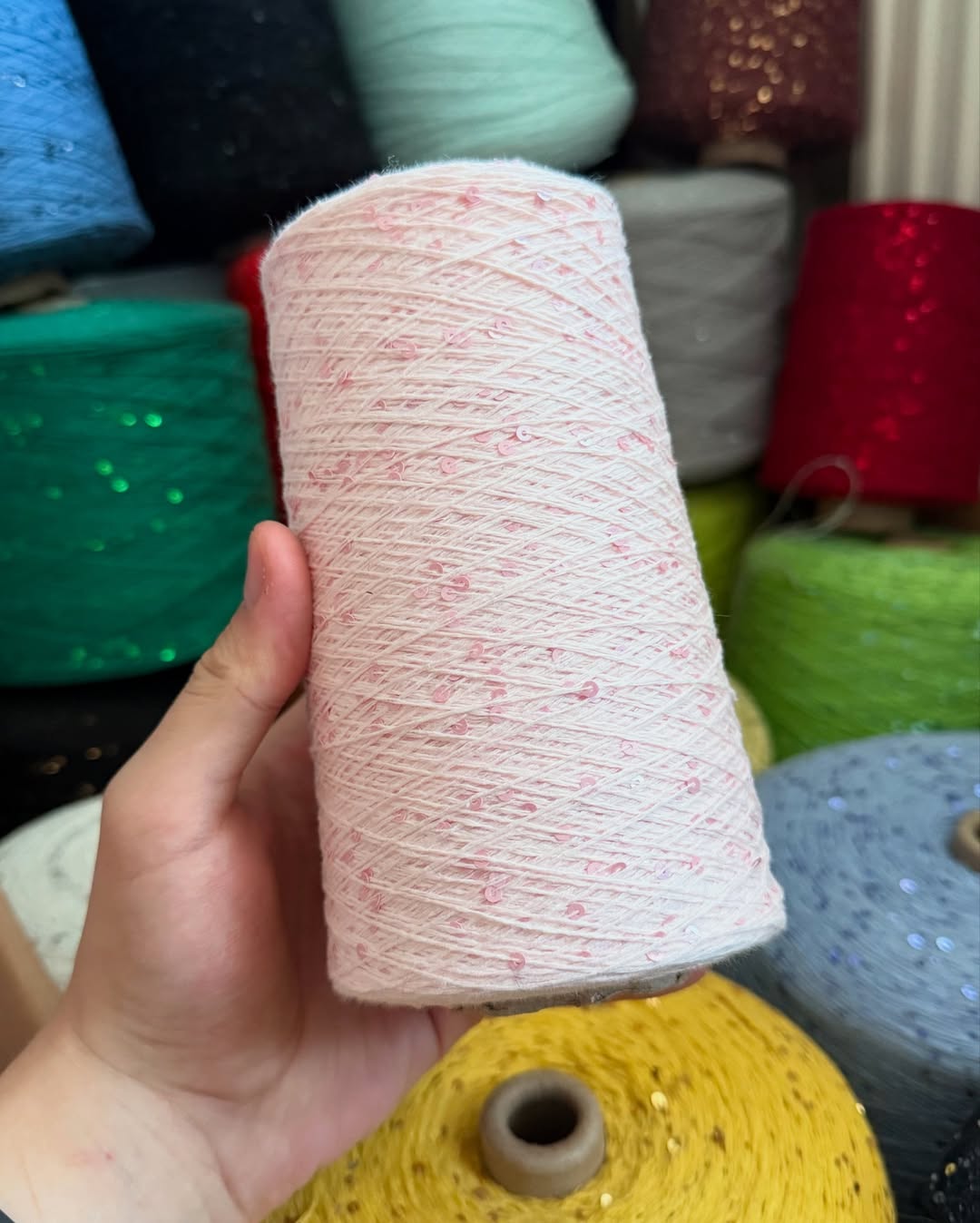 Brilliant light reflection on sequin cotton strand