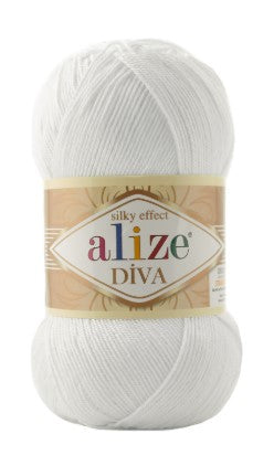 Ball of white yarn with Alize Diva 55 label on a white background