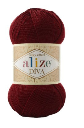 Red ball of yarn with Alize Diva 57 label on a white background
