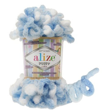 Blue and white fluffy yarn in a container with 'alize 5865' branding on a white background