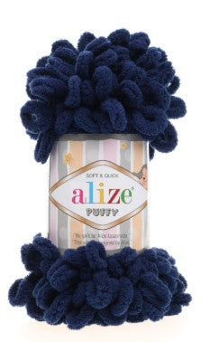 A dark blue skein of plush yarn with loops from Alize, convenient for hand knitting blankets