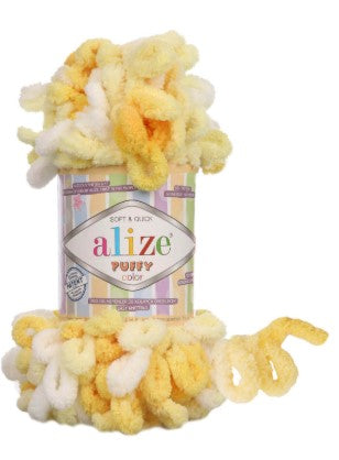 Colorful fuzzy yarn with packaging labeled 'alize 5921' on a white background