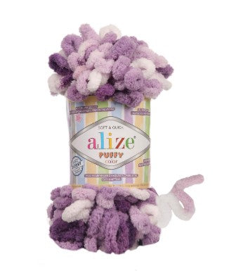 Purple and white yarn with a visible 'alize 5923 label on a white background