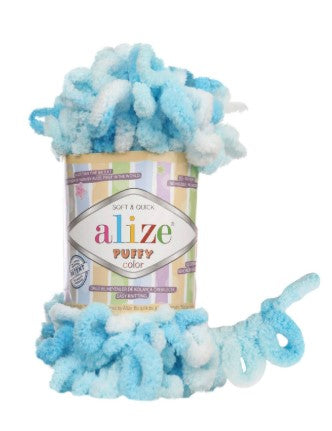 Alize Puffy Color 5924 yarn with blue and white puffs on a white background