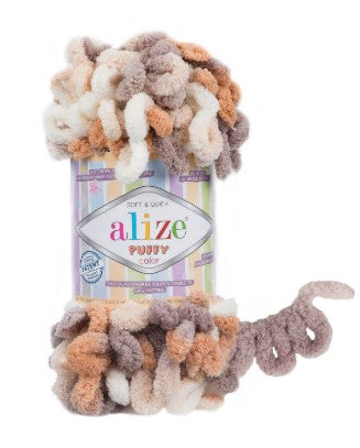 Alize 5926 fluffy yarn skein with packaging on a white background
