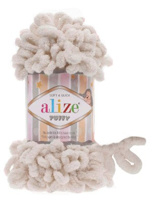 Alize Puffy 599 yarn with packaging on a white background