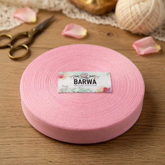 Premium candy pink t-shirt yarn roll 7-9mm made from 100% virgin cotton, chunky yarn for crochet and knitting, styled with vintage scissors and rose petals on wooden background