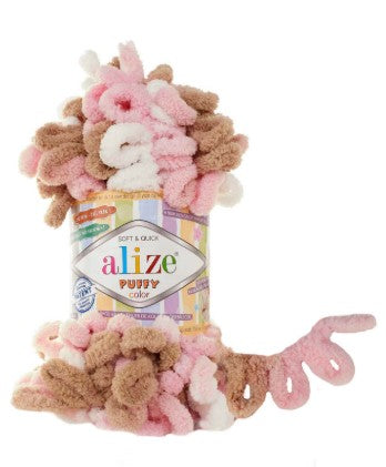 Alize Puffy 6046 yarn ball with colorful label on a white background