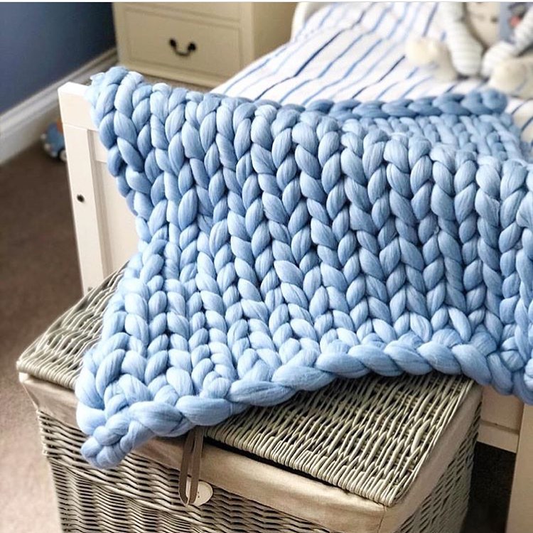 Pink giant merino wool knit throw detail