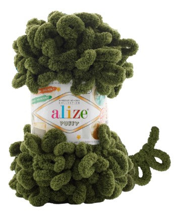 Green yarn with Alize label on a white background