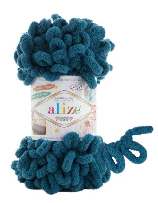 Blue yarn with Alize label on a white background