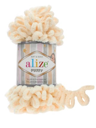 Alize Puffy 742 yarn with packaging on a white background