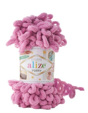 Pink yarn ball with 'alize' label on a white background