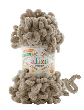 Ball of yarn with 'Alize' label on a white background
