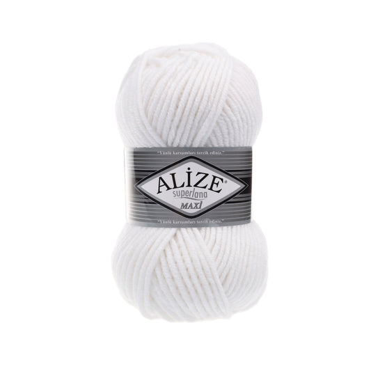 White ball of yarn with Alize SUPERLANA MAXI 55 label on a white background