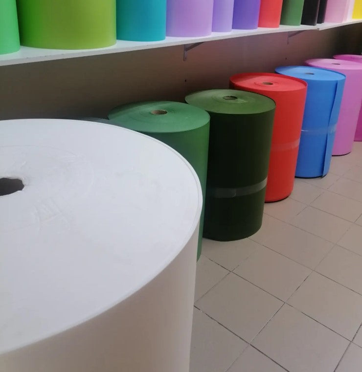 Artisan heat-shaping white Izolon foam petals for voluminous giant roses. Flexible premium material for lifelike wedding backdrops and DIY florals.