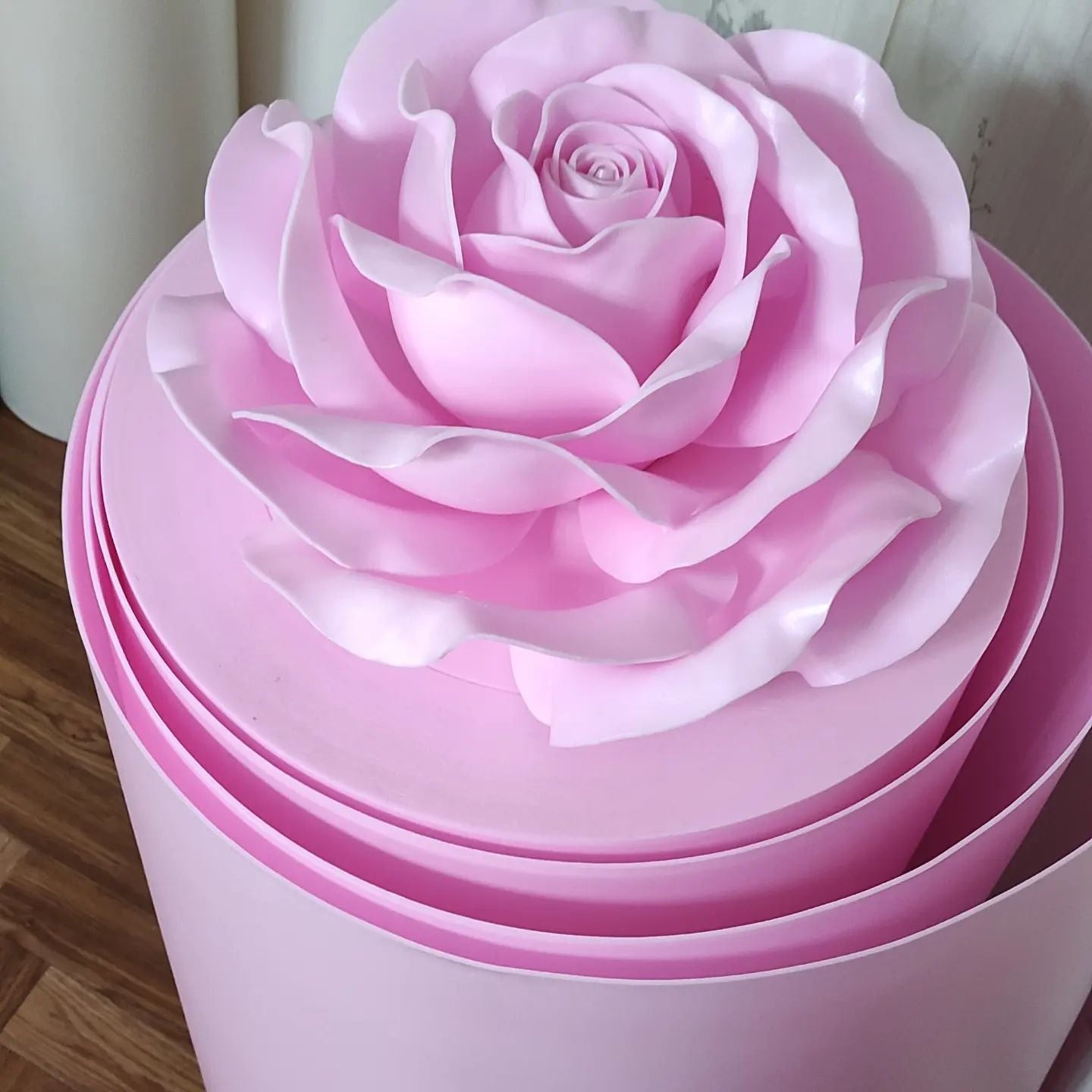 Heat-forming nude Izolon foam petals into massive blush giant rose. Premium flexible material creates flowing, lifelike voluminous blooms.