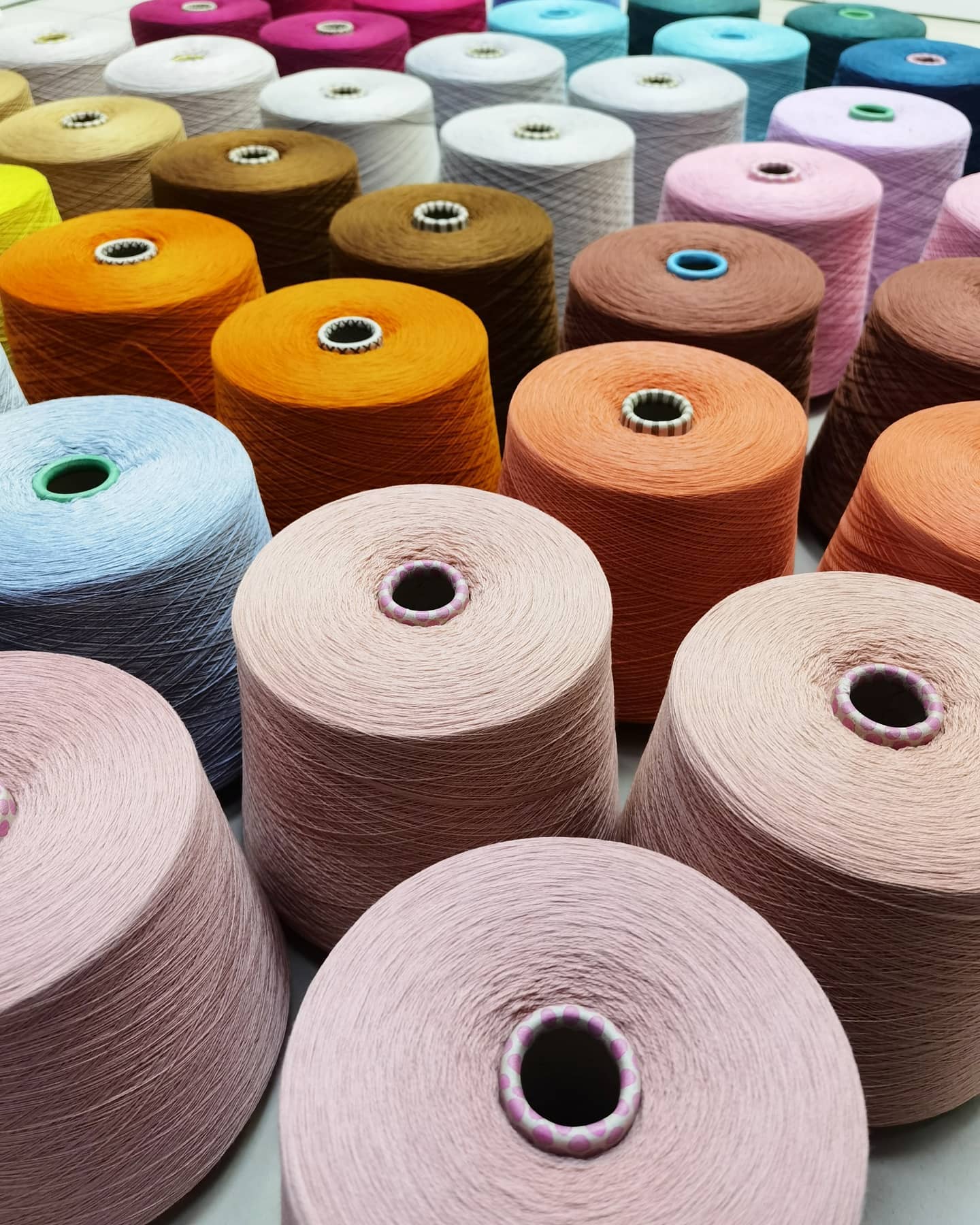 Italian luxury merino yarn close-up showing fine ply and shine, 100% extra fine wool 2/16 Nm, perfect for socks, summer tops, and intricate lace patterns