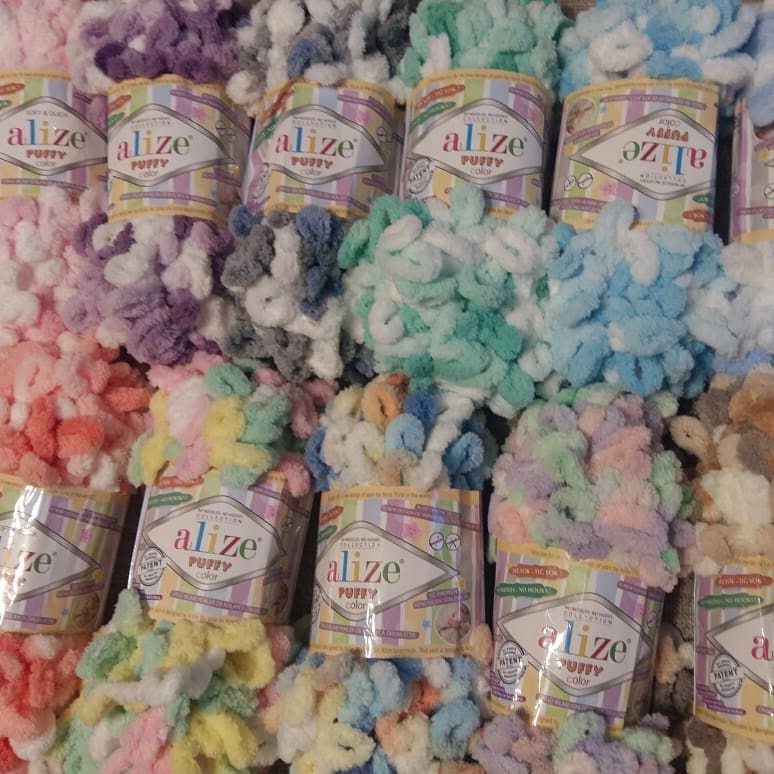 Alize Puffy Color yarn ball showing fluffy chenille texture and colorful loops, ideal for scarves and cuddle toys