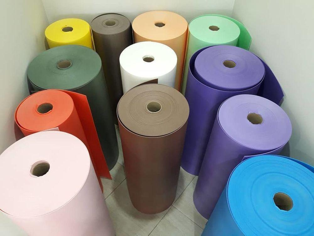 Multicolored Izolon foam rolls in pink, nude, teal – 2mm thick for giant flower making. Waterproof, fade-resistant sheets for custom oversized blooms.